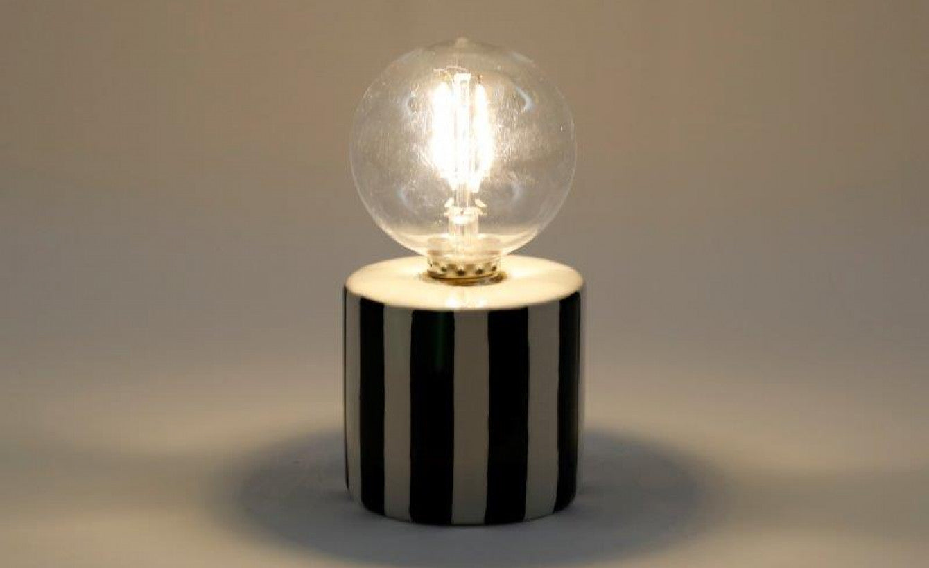 Black and white strip bulb light