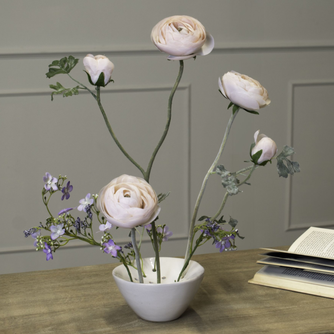 Off white ceramic flower frog